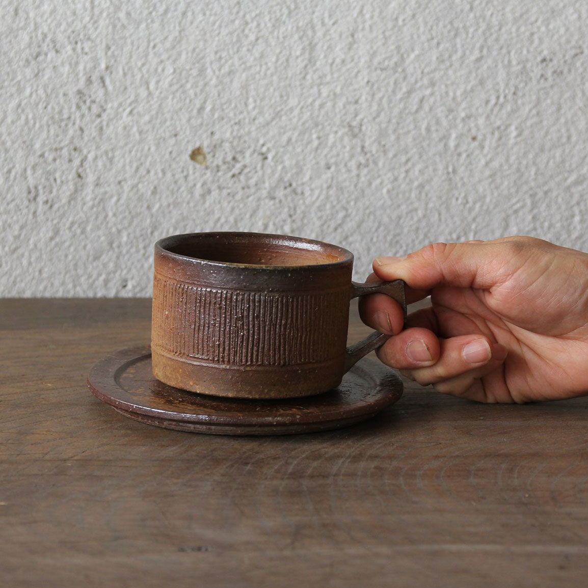 Cup and saucer (comb pattern)