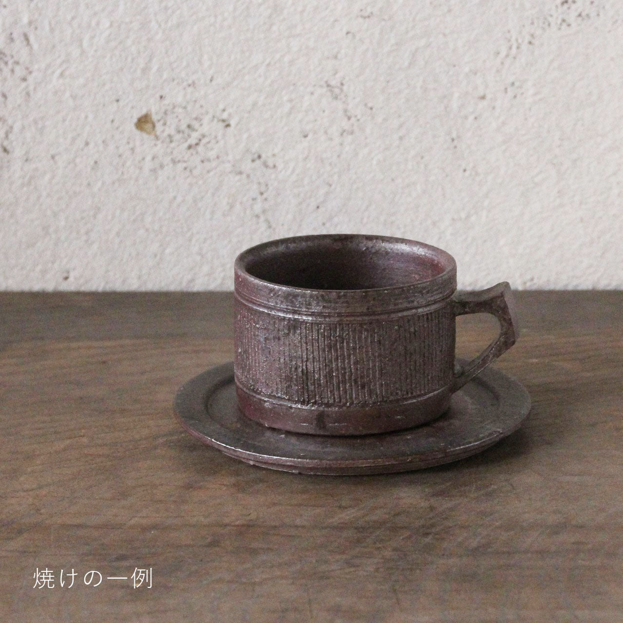 Cup and saucer (comb pattern)